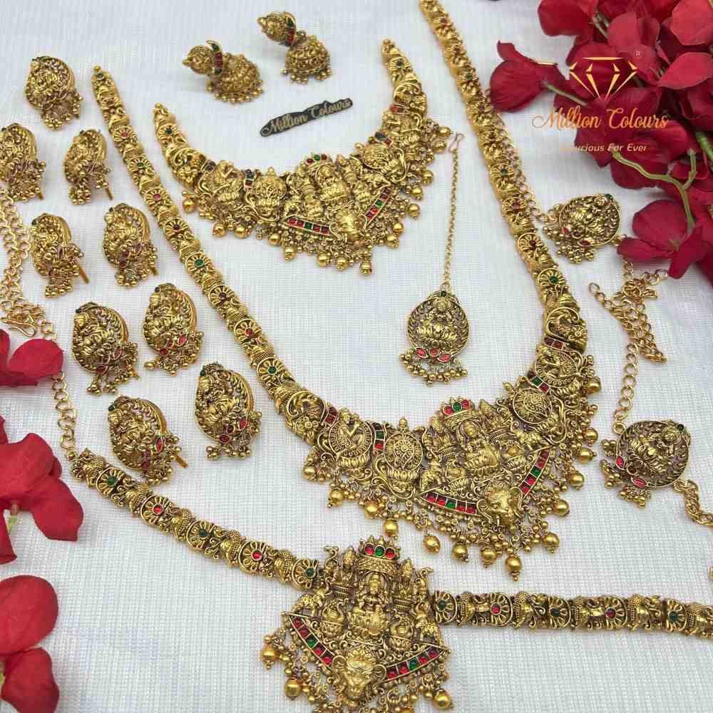 Antique Gold Finish Traditional Bridal Wedding Jewellery  Red and Green Stone Detailing By Million Colours